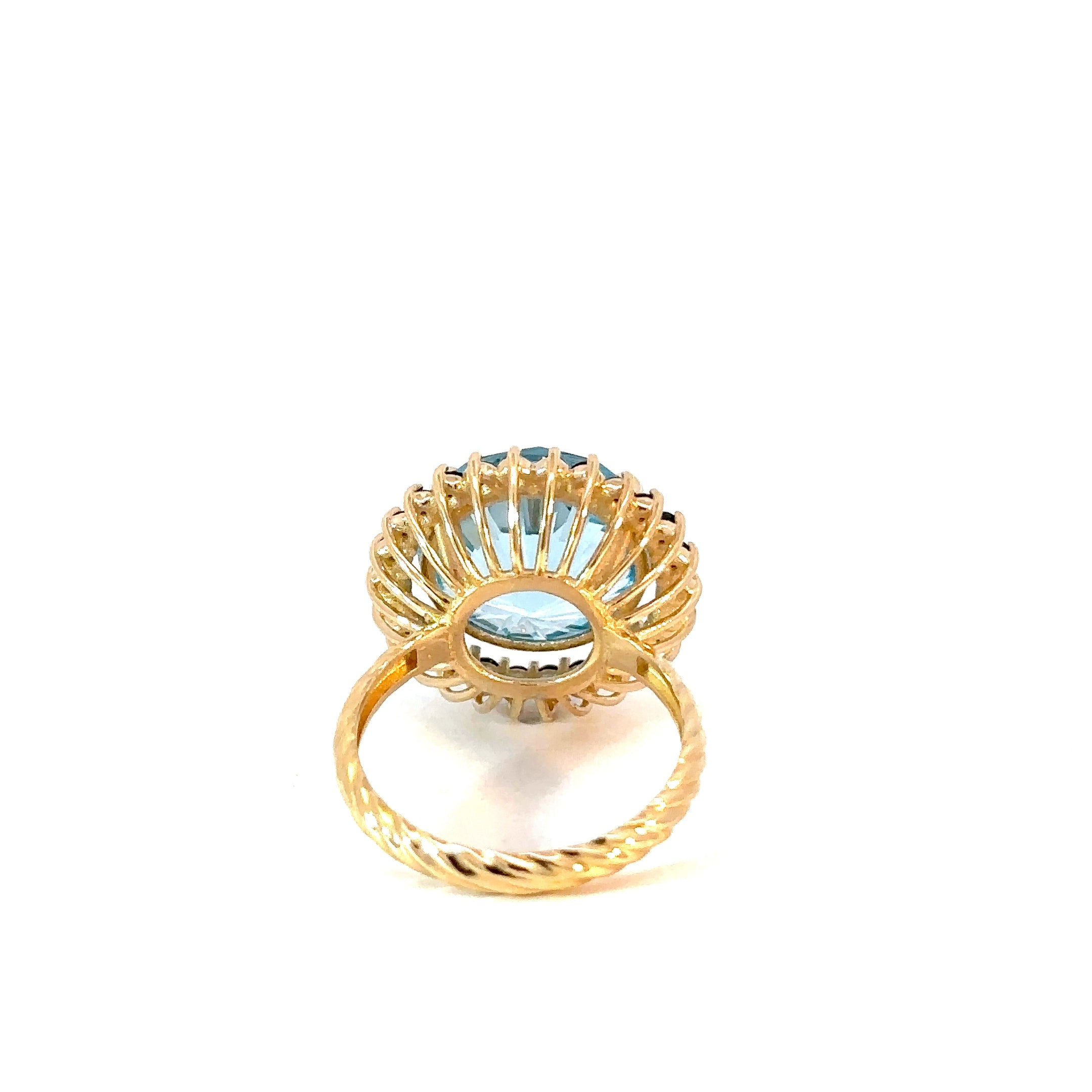Anillo Flora topacio swiss blue y zafiros azules