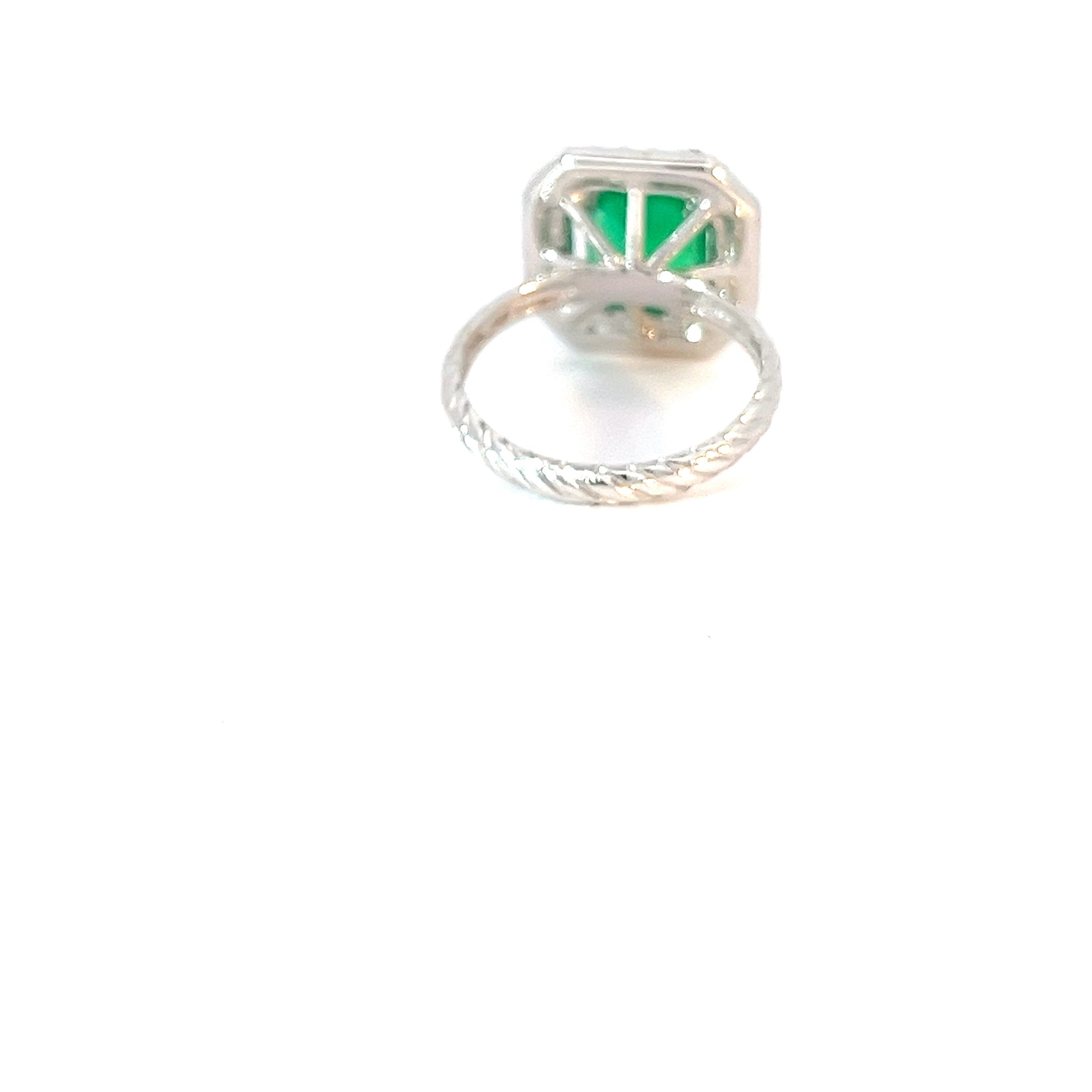 Anillo Esmeralda doble halo