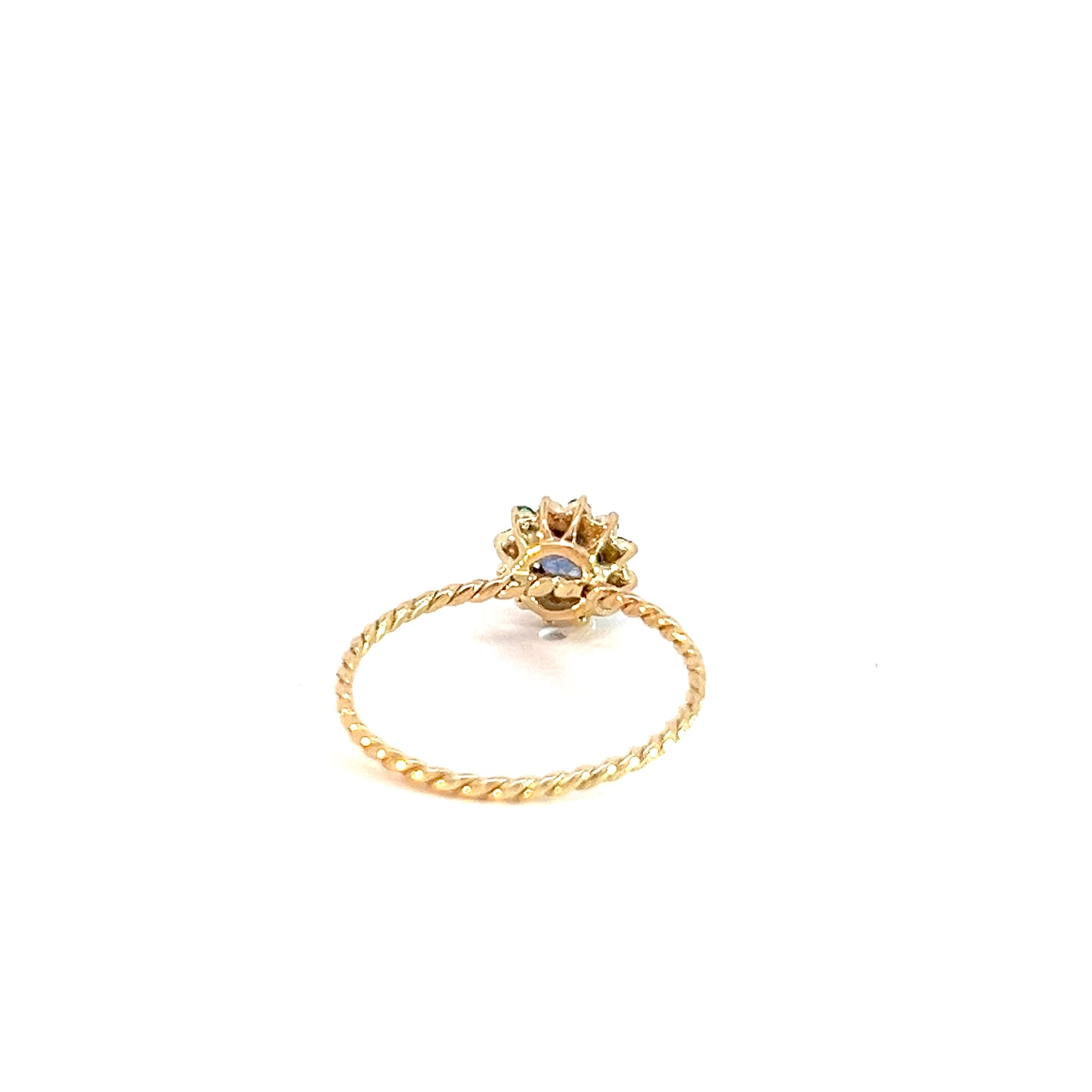 Anillo Flora zafiro azul y esmeraldas