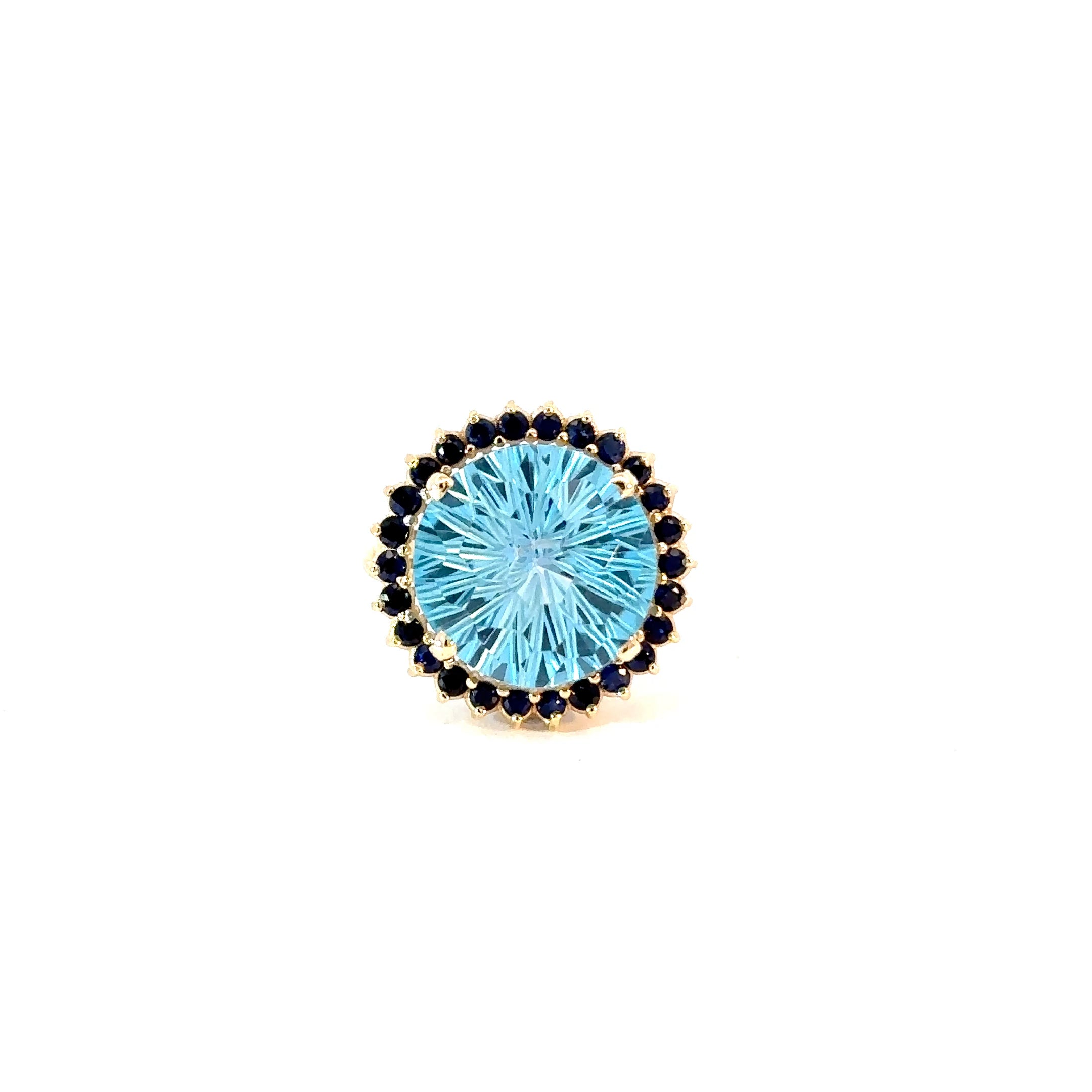 Anillo Flora topacio swiss blue y zafiros azules