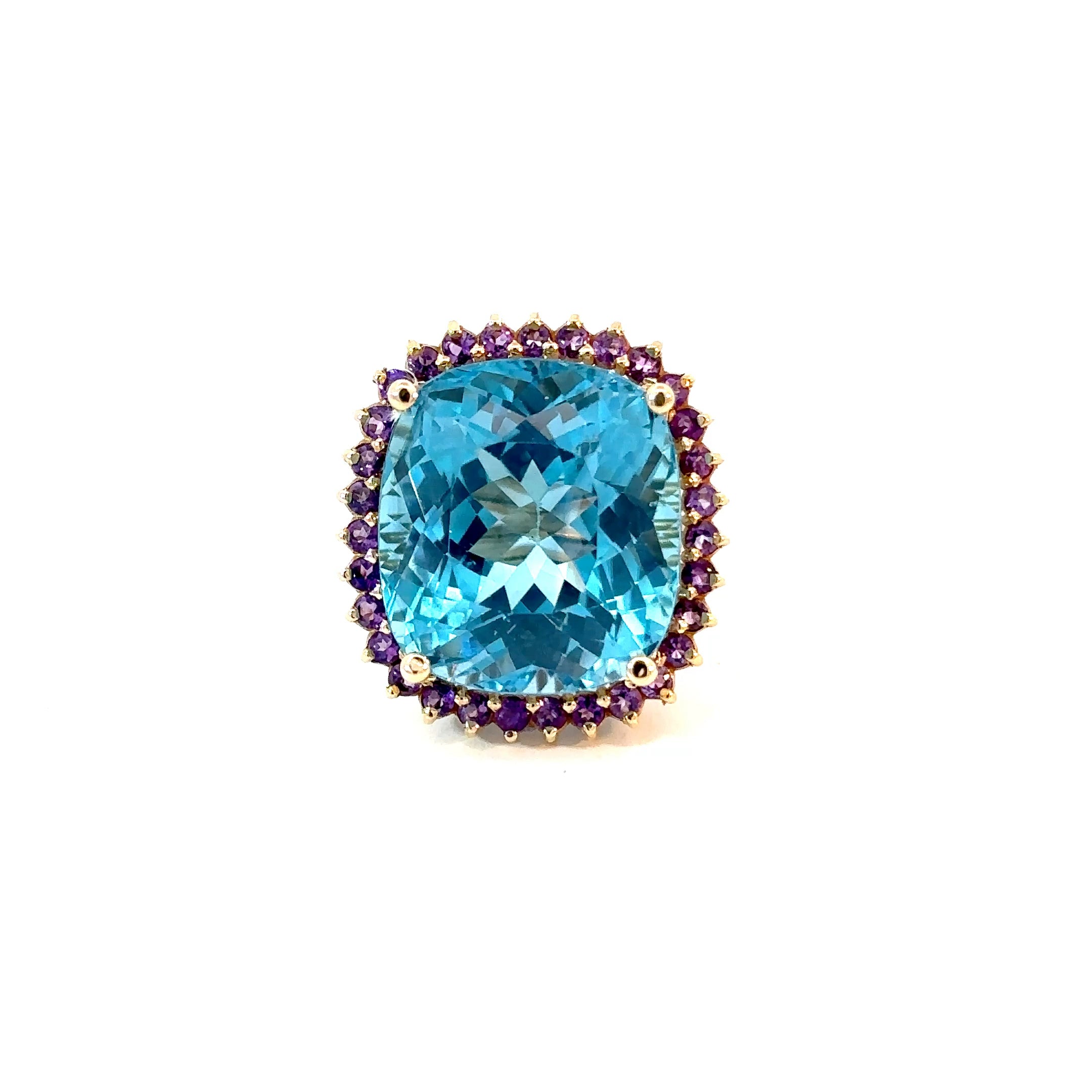 Anillo grande topacio swiss blue cojin con amatistas