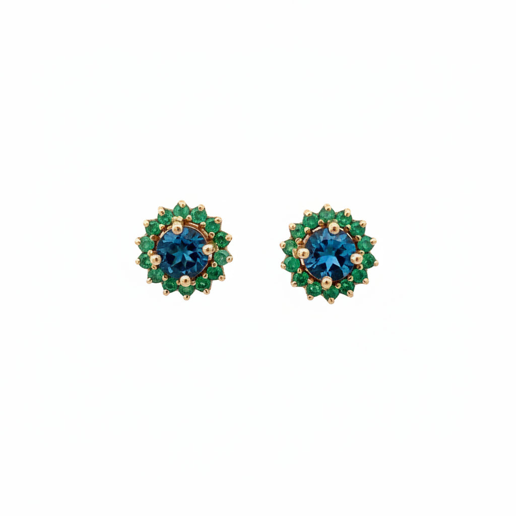 Aretes Flora topacio london blue 5mm y esmeraldas